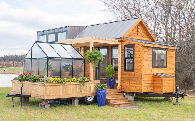 This small house is only 30 square meters and has a greenhouse - one peek inside and I fell in love immediately!