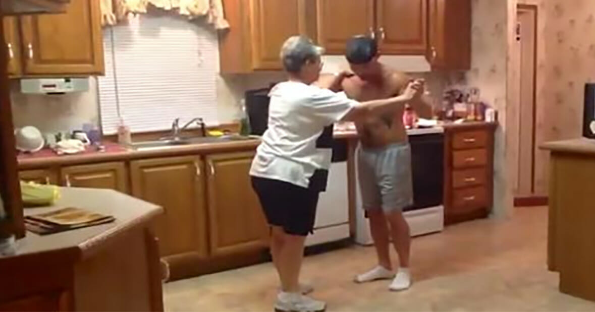 Son took his mother's hand when the favorite song began to play - now watch the dance that conquered the internet by storm